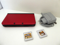 Nintendo 3DS XL Konsole in Rot / Schwarz mit Ladekabel und 2 Spielen