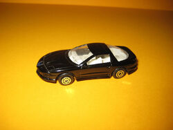 Welly - 1:64 - Ponitac Firebird 1995 - schwarz