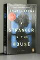 A Stranger in the House: A Novel