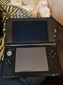 Nintendo 3DS XL in Rot/Schwarz lesen