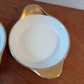 Ein glamouröses Paar Royal Worcester Goldporzellan Glanzware Gratingerichte 