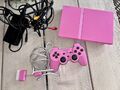 SONY Playstation 2 Slim pink inkl. Controller, Spiele und Adapter