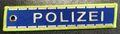 Schlüsselanhänger "POLIZEI" in grau/neongelb - 13 x 2,8 cm