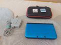 Nintendo 3DS XL -Spielkonsole - Blau/Schwarz + 2 3DS Spiele