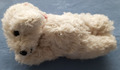 Bär Teddy Künstlerteddy aus PLÜSCH cremeweiß liegend, 12 cm UNIKAT - HANDARBEIT