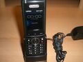 AGFEO DECT 60 IP  Systemtelefon in schwarz mit Ladeschale und Netzteil