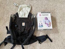 Babytrage - ERGOBABY 360 - mit Sonnenschutz und Neugeboreneneinsatz - Schwarz bi