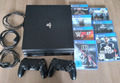  Sony PlayStation 4 Pro 1TB  - Schwarz, gebraucht mit 2 Controller und 7 Spiele