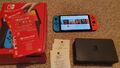 Nintendo Switch OLED - 64GB - Schwarz/Neon-Rot/Neon + 128GB SANDISK + Tragetasche