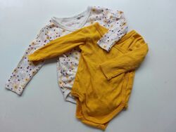 2er Set Baby Wickelbodies in Größe 62/68 von "Lupilu" orange und weiß geblümt