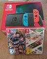 Nintendo Switch 2022 Edition 32GB Spielkonsole - Rot/Blau Inkl. 2 Spiele