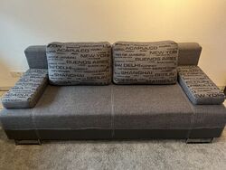 Schlafsofa mit Bettkasten gebraucht in grau