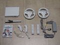 Nintendo Wii Konsole weiß + Mario Kart + 2x Remote + 2 Nunchuk + 2 Lenkräder