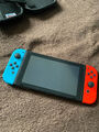 Nintendo Switch Konsole mit Joy-Con - Neon-Rot/Neon-Blau/Grau, Wie Neu