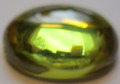 1 Cubic Zirkonia 10 x 8 mm, oval, Peridot, Cabachon- synthetischer Edelstein