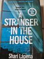 A Stranger in the House: From the author of THE COUPLE NEXT DOOR by Shari Lapena