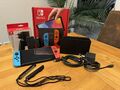 Nintendo Switch OLED-Modell HEG-001 64GB Handheld-Spielekonsole - OVP - Blau/Rot