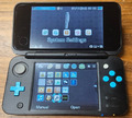 New Nintendo 2DS XL (JAN-001) Schwarz/Blau Handheld-Spielkonsole.