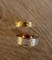 Love ring edelstahl vergoldet. neuwertig, rosegold und gelbgold