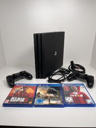 Sony PlayStation 4 pro 1tb 2 controller 3 games GREAT CONDITION