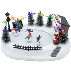 Led Weihnachtsszene Eisbahn mit fahrenden Figuren - 29 x 21 cm - Deko Winterstadt bunt beleuchtet mit Musik - Weihnachts Winter Dorf Szene Tisch